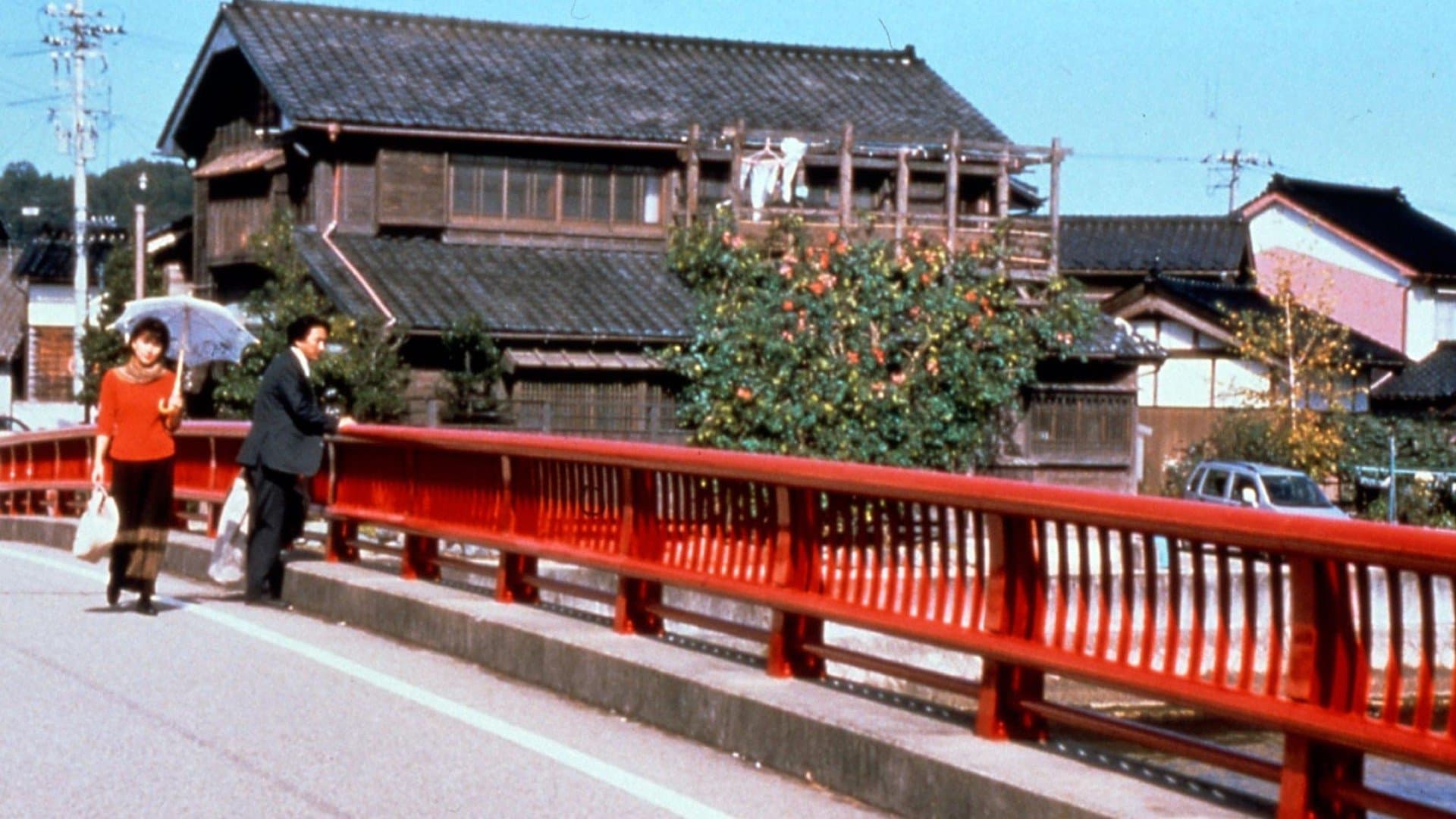 Warm Water Under a Red Bridge Backdrop